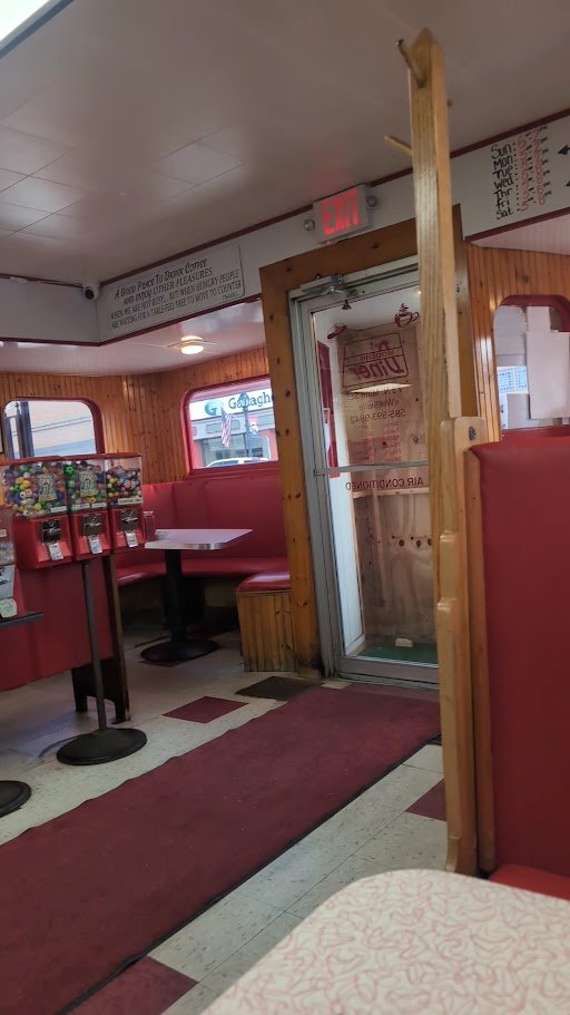 Cozy diner booths with table service.