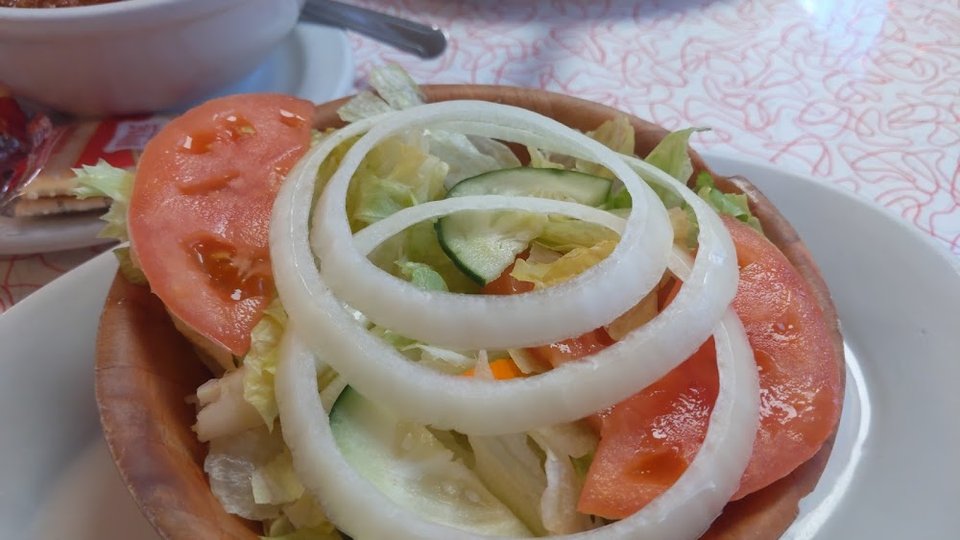 Diner menu page with salads and appetizers.